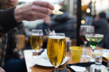gold beer in beer mug service in the open air public bar