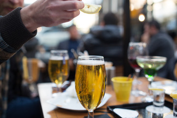 gold beer in beer mug service in the open air public bar
