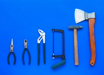 Joinery tools on blue background. Place for the text. A concept for Father's Day.