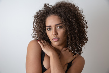 Beauty portrait of african american woman with afro hairstyle and glamour makeup