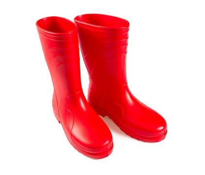 red rubber boots isolated on white