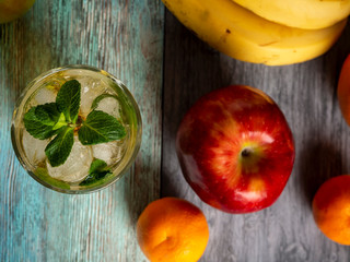 Apple, red green, bananas, oranges, tangerines, pomelo, juice, ice