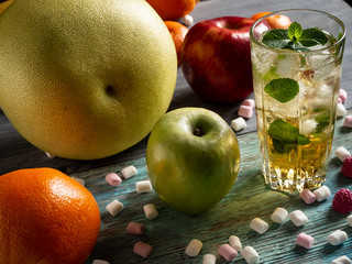 Apple, red green, bananas, oranges, tangerines, pomelo, juice, ice