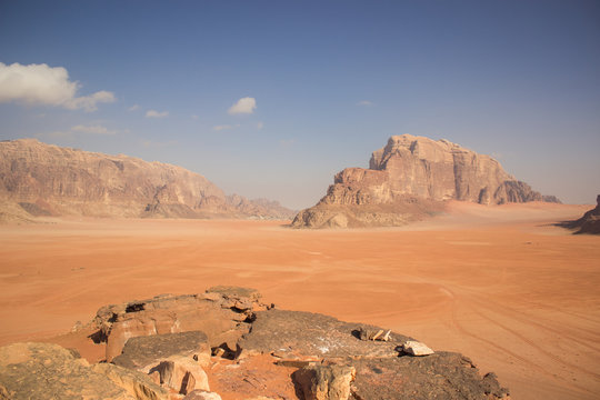 Jordan desert Middle East scenic landscape picturesque desert vivid yellow environment with beautiful rock mountain background , world travel photography concept - Powered by Adobe