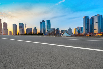 Obraz premium Highway Road and Skyline of Modern Urban Architecture in Qingdao..