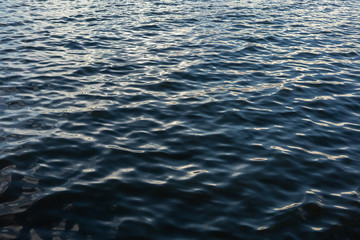 Dark blue ripple water and surface. Beautiful motion wave.