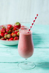 strawberry milk shake on wooden surface