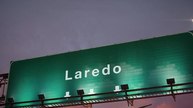 Airplane Landing Laredo during a wonderful sunset