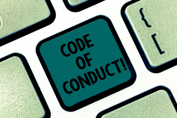 Handwriting text writing Code Of Conduct. Concept meaning Ethics rules moral codes ethical principles values respect Keyboard key Intention to create computer message pressing keypad idea