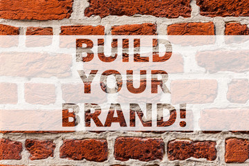 Writing note showing Build Your Brand. Business photo showcasing company creates or improves customers knowledge and opinion Brick Wall art like Graffiti motivational call written on the wall