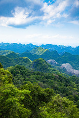 Naklejka premium scenic view over Ha Long bay from Cat Ba island, Ha Long city in the background, UNESCO world heritage site, Vietnam