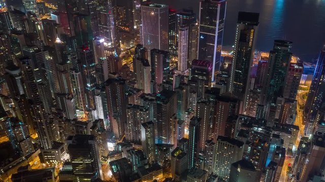 HONG KONG - MAY 2018: Aerial timelapse view of Causeway Bay and Wan Chai disrtict, city from above at night.