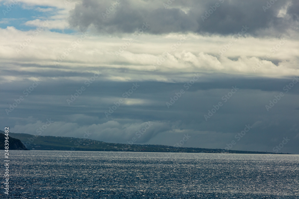 Wall mural landscape with clouds