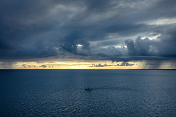 sunset over the sea with boar