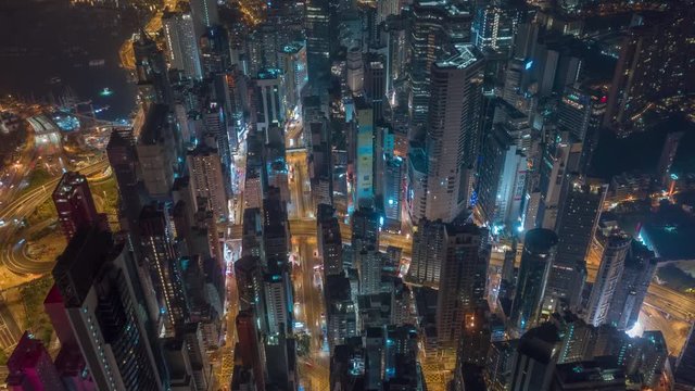 HONG KONG - MAY 2018: Aerial timelapse view of Causeway Bay and Wan Chai disrtict, city from above at night.