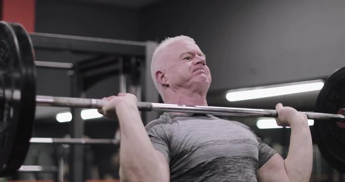 Mature male weightlifter at the gym