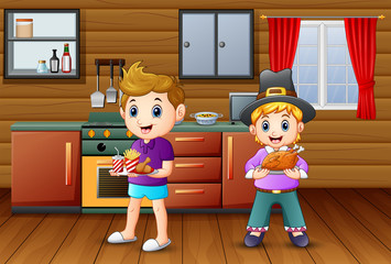 Two boy bringing a food in the kitchen