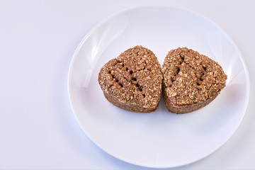 wheat germ bread and rye on a white round plate. healthy food. bread.