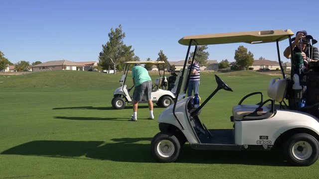 Senior Citizens using Golfcart