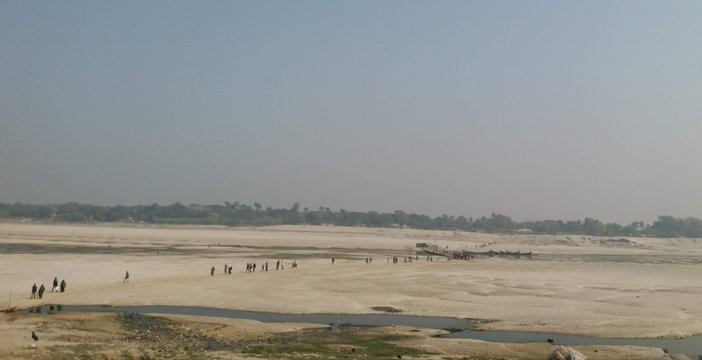 It's a river, named gorai. Now there is no water in the river. The river has become desert, only sand and sand