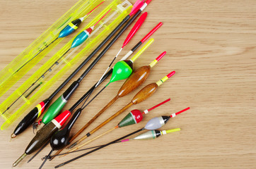 Fishing floats on a wooden table © yrafoto