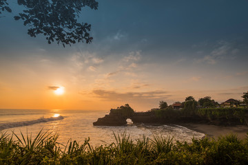 Silhouette Tanah Lot with sun set in evening at Bali, Indonesia.