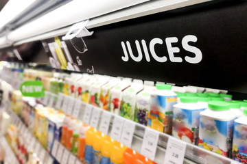 Juices signage at the fresh chiller refrigerated section of supermarket