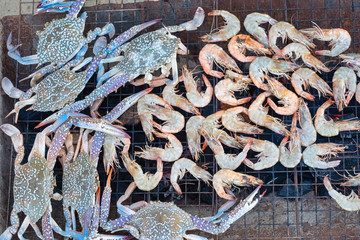 Grilled Bbq Seafood On Stove Party, shrimp and crab grill. Top view.