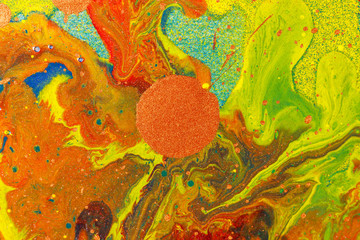 Drops and stains of paints of different colors. Abstract background.