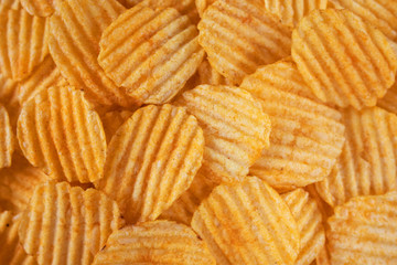 Relief potato chips closeup background