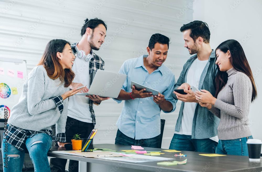 Poster diversity designer in casual cloth using technology device at meeting table in meeting room at creat