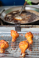 Thai style fried chicken very hot just take out from the pan.
