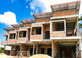 unfinished commercial buildings are under construction / work in progress