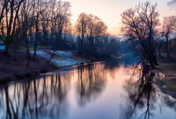 Landscape of the river in late autumn at sunset