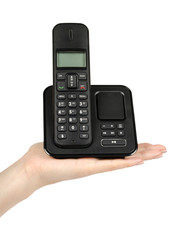 modern landline cordless phone with hand, old technology concept.