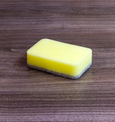 The yellow sponge for cleaning the room