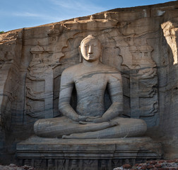 Stone image of Buddha Gautama in dhyana mudra.
