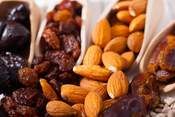 dried super foods on white wood table background