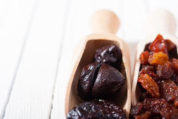 dried super foods on white wood table background