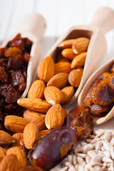 dried super foods on white wood table background