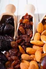 dried super foods on white wood table background