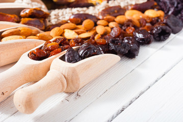 dried super foods on white wood table background