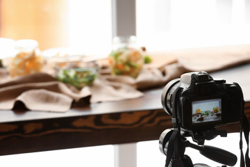 Photo of vegetables on screen of professional camera in studio