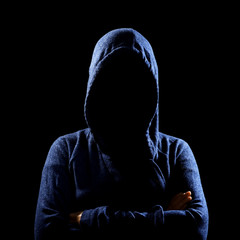 Anonymous silhouette of woman in hoodie