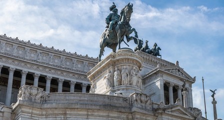Fototapeta na wymiar Rome, Italy. Famous Vittoriano with gigantic equestrian statue of King Vittorio Emanuele II at Piazza Venezia