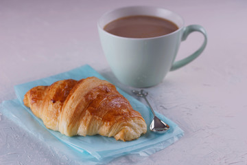 Breakfast with fresh croissants.