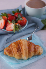 Breakfast with fresh croissants.