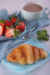 Breakfast with fresh croissants.