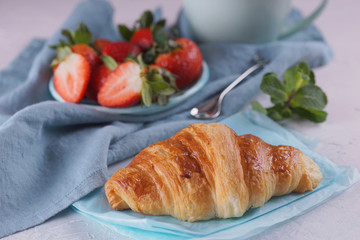 Breakfast with fresh croissants.
