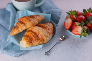 Breakfast with fresh croissants.